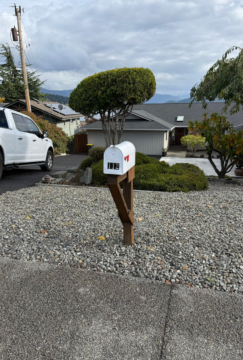 Replacing a Leaning Mailbox on a Busy Road With a High-Security Locking Mailbox