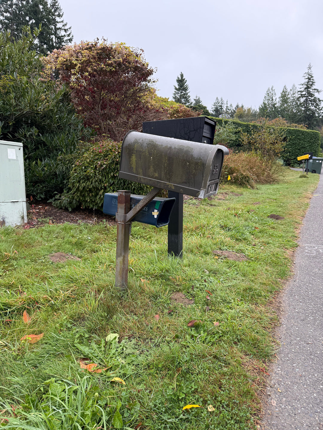 Replacing a Damaged Mailbox With a Reinforced Steel Post and Locking Mailbox